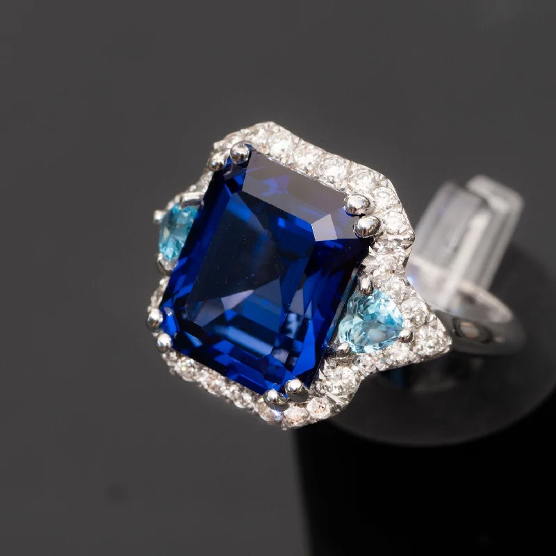 Suzanne - 13.18 carat sapphire ring with 0.80 carat natural diamonds & 0.70 carat topaz