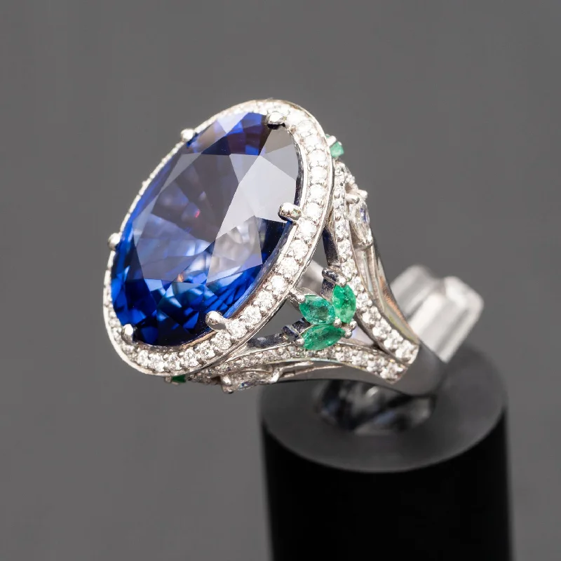 Belle - 23.00 carat oval sapphire ring 0.68 carat natural emerald, 1.00 carat natural diamonds