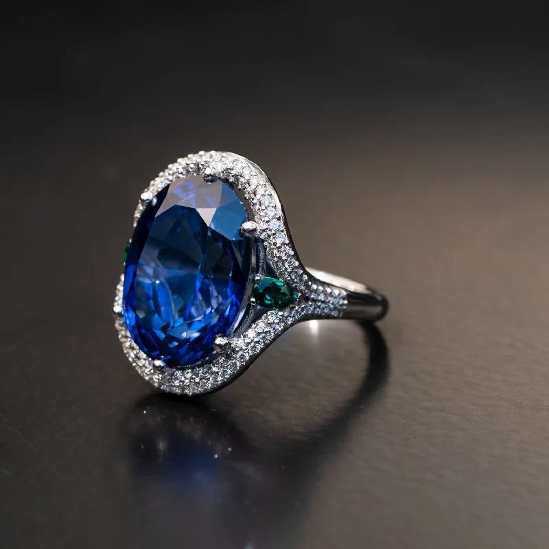 Cecile - 24.00 carat sapphire ring with 0.82 carat natural diamonds