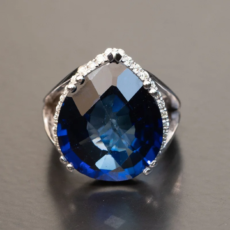 Darcey - 28.00 ct pear sapphire ring with 0.61 carat natural diamonds