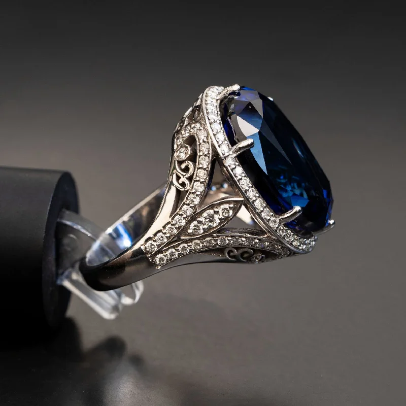 Elizabeth - 26.00 carat oval sapphire ring with 1.20 carat natural diamonds