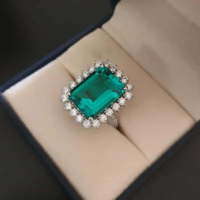 Oasis -10.72 carat emerald ring with 2.10 carat natural diamonds