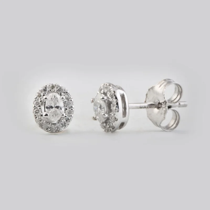 1/3ct TDW Diamond Oval Shape Diamond Halo Earrings in 10k Gold by De Couer